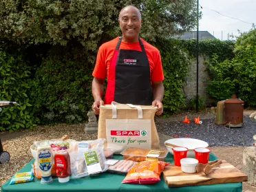 Colin Jackson with SPAR BBQ products